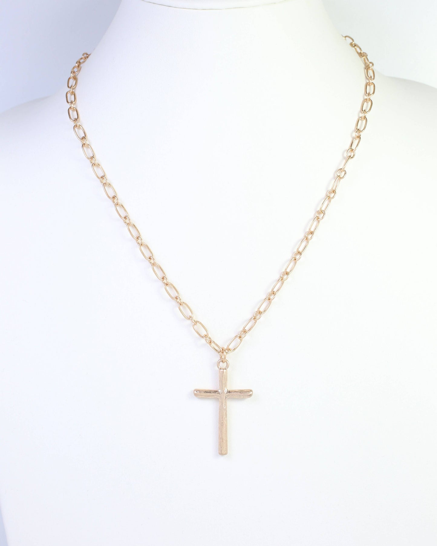 Cassia Textured Cross Necklace Worn Gold