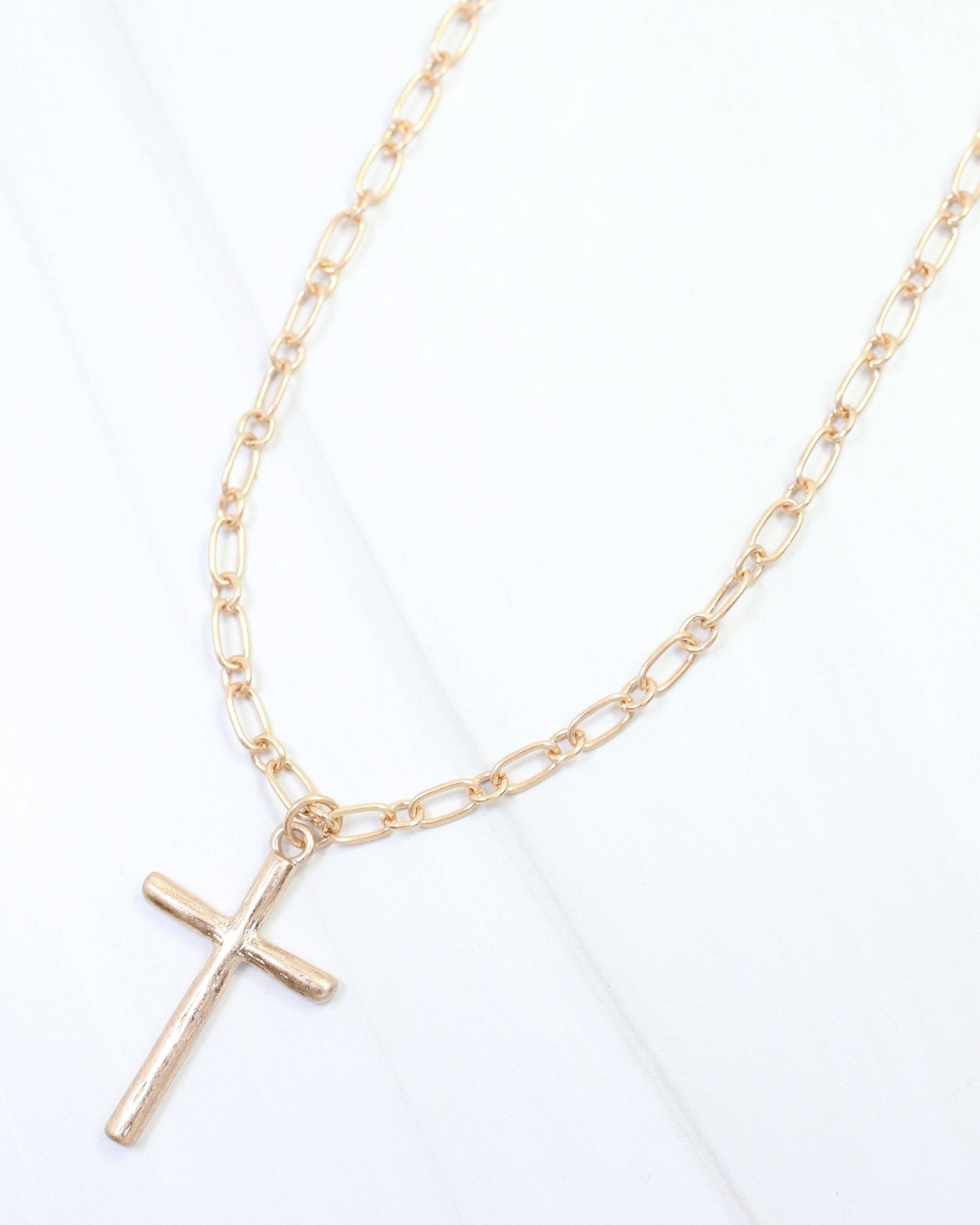 Cassia Textured Cross Necklace Worn Gold